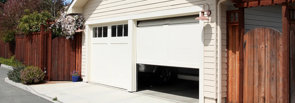 Fix Metal Garage Door Jerking in Sunrise